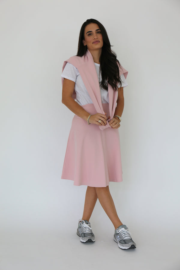 Front facing model wearing a spandex cotton circle skirt in rose